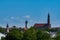 Ãœberblick Ã¼ber Straubing in Niederbayern, Ortskern Theresienplatz, Wasserturmund Stadtturm im Sommer bei blauem Himmel