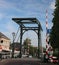 Ã’ld steel drawbridge over river Hollandse IJssel in the city of Haastrecht in the Netherlands