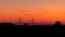 The Ã–resund bridge sunset silhouette during warm summer evening