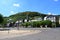 Ãœrzig Germany - 08 25 2022: Mosel waterfront road in Ãœrzig with vineyards