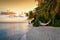 Î‘ hammock on a tropical beach in the Maldives