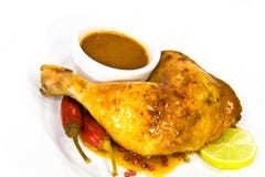 A Big Chicken Leg- Roasted With Red Peppers Stock Image