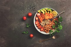 A Bowl Of Healthy Vegan And Vegetarian Lunch Or Dinner. Salad Of Fried Chickpeas, Quinoa, Avocado, Fried Sweet Potatoes And Royalty Free Stock Photos A Bowl Of Healthy Vegan And Vegetarian Lunch Or Dinner. Salad Of Fried Chickpeas, Quinoa, Avocado, Fried Sweet Potatoes And Royalty Free Stock Photos