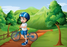 A Boy Standing In The Middle Of The Pathway With His Bike Royalty Free Stock Images A Boy Standing In The Middle Of The Pathway With His Bike Royalty Free Stock Images