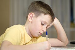 A Boy Student Learns Lessons Royalty Free Stock Photos