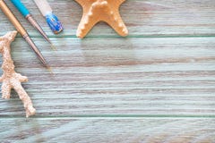 A Brown Background With A Starfish And Nails. Royalty Free Stock Photo A Brown Background With A Starfish And Nails. Royalty Free Stock Photo