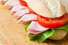 A Large Ham And Tomato Baguette Stock Image A Large Ham And Tomato Baguette Stock Image