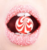 A Lollipop In The Mouth Stock Image
