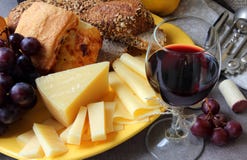 A Plate Of Cheese And A Glass Of Wine. Royalty Free Stock Photos