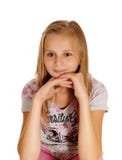 A Sad Looking Young Girl Sitting On Chair. Royalty Free Stock Image