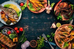 A Set Of Food. Steak, Fish, Vegetables And Spices. On A Wooden Background. Stock Images