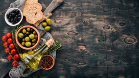 A Set Of Olives, Olive Oil, Bread, Cheese And Spices Royalty Free Stock Images A Set Of Olives, Olive Oil, Bread, Cheese And Spices Royalty Free Stock Images