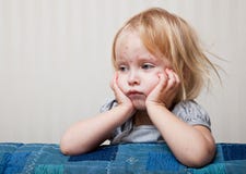 A Sick Girl Is Sitting Near The Bed Royalty Free Stock Images A Sick Girl Is Sitting Near The Bed Royalty Free Stock Images