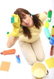 A Woman Tired Of Cleaning Royalty Free Stock Image