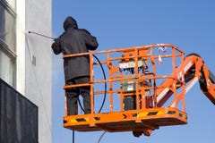 A Worker In A Cherry-picker Royalty Free Stock Photography