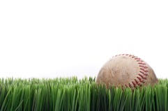 A Worn Leather Baseball In Grass Stock Images