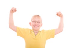 A Young Boy Flexes His Muscles Stock Photos