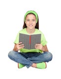 Aanbiddelijk meisje dat een boek leest stock fotografie Aanbiddelijk meisje dat een boek leest stock fotografie