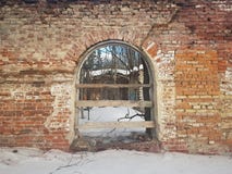 Abandoned and destroyed red brick building in winter stock image Abandoned and destroyed red brick building in winter stock image