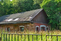 Abandoned red brick house surrounded by trees and grass stock images Abandoned red brick house surrounded by trees and grass stock images