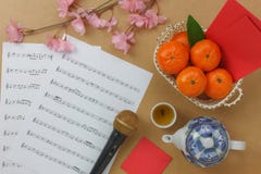 Above view Chinese & Lunar new year with music sheet notes concept royalty free stock images Above view Chinese & Lunar new year with music sheet notes concept royalty free stock images