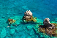 Above View Of Couple Snorkeling In Turquoise Sea Water, Glyka Nera, Chania, Crete. Royalty Free Stock Photos Above View Of Couple Snorkeling In Turquoise Sea Water, Glyka Nera, Chania, Crete. Royalty Free Stock Photos