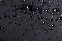 Abstact water drops on poniched stainless steel surface. Close up Stock Image Abstact water drops on poniched stainless steel surface. Close up Stock Image