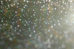 Abstract background - light color flashes and rays on black. Lens flare. For use as texture layer in your project. Royalty Free Stock Image Abstract background - light color flashes and rays on black. Lens flare. For use as texture layer in your project. Royalty Free Stock Image