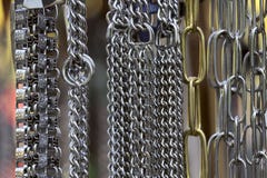 Abstract background. Various hanging metal chains. stock photo Abstract background. Various hanging metal chains. stock photo