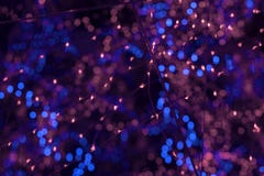 Abstract Background With Garland Lights Bokeh On Red And Blue Stock Photography