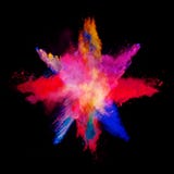 Abstract colored powder explosion isolated on black background. Stock Photo Abstract colored powder explosion isolated on black background. Stock Photo