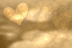Abstract festive blur bright brown pastel background with a big colorful heart love bokeh for wedding card or Mothers day. stock photography Abstract festive blur bright brown pastel background with a big colorful heart love bokeh for wedding card or Mothers day. stock photography