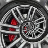 Abstract sport car spiral wheel rim with tire, brake disc. Automobile repetitive pattern background illustration. Car wheel and ti Royalty Free Stock Images Abstract sport car spiral wheel rim with tire, brake disc. Automobile repetitive pattern background illustration. Car wheel and ti Royalty Free Stock Images