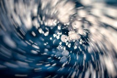 Abstract yellow bokeh of blurry swirl lights background. Heavy blurred light effects of a rippled, blue water background. Creative royalty free stock images Abstract yellow bokeh of blurry swirl lights background. Heavy blurred light effects of a rippled, blue water background. Creative royalty free stock images
