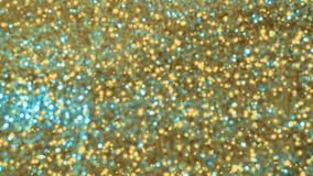 Abstracte Gouden glanzende bokeh op licht gekleurde achtergrond Gloeiende achtergrond met bokehstijl voor seizoengebonden groeten royalty-vrije stock foto's Abstracte Gouden glanzende bokeh op licht gekleurde achtergrond Gloeiende achtergrond met bokehstijl voor seizoengebonden groeten royalty-vrije stock foto's