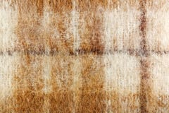 Abstracte textuur van gebreide wol met bruine strepen Achtergrond van natuurlijke wol Stock Fotografie Abstracte textuur van gebreide wol met bruine strepen Achtergrond van natuurlijke wol Stock Fotografie