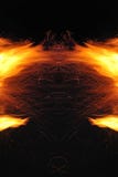 Abstraction, burning fire with sparks. Mystical prototype with patterns for the background. Horizontal reflection stock photography Abstraction, burning fire with sparks. Mystical prototype with patterns for the background. Horizontal reflection stock photography