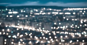 Abstrakcjonistyczny błękitny kółkowy bokeh tło, miasto zaświeca w twil Obraz Stock Abstrakcjonistyczny błękitny kółkowy bokeh tło, miasto zaświeca w twil Obraz Stock