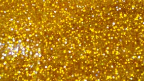 Abstrakcjonistyczny Złoty błyszczący bokeh na świetle zabarwiał tło Rozjarzony tło z bokeh stylem dla sezonowych powitań fotografia royalty free Abstrakcjonistyczny Złoty błyszczący bokeh na świetle zabarwiał tło Rozjarzony tło z bokeh stylem dla sezonowych powitań fotografia royalty free
