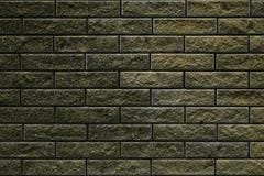 Abstrakt grön grå textur för tegelstenvägg för tapetdesign v?gg f?r bakgrundstegelstengrunge V?ggcementtextur Mörka gråa stenlodi arkivbild Abstrakt grön grå textur för tegelstenvägg för tapetdesign v?gg f?r bakgrundstegelstengrunge V?ggcementtextur Mörka gråa stenlodi arkivbild
