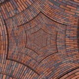 Abstrakte braune Hexenspiralenbacksteinmauermuster-Hintergrundbeschaffenheit des roten Quadrats Gewundenes fract Muster des Winke Lizenzfreie Stockfotos Abstrakte braune Hexenspiralenbacksteinmauermuster-Hintergrundbeschaffenheit des roten Quadrats Gewundenes fract Muster des Winke Lizenzfreie Stockfotos