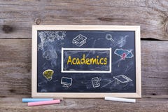 Academics on blackboard. Knowledge Education study Learning Concept royalty free stock photo Academics on blackboard. Knowledge Education study Learning Concept royalty free stock photo