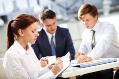 Account of meeting. Young secretary keeping minutes of meeting Account of meeting. Young secretary keeping minutes of meeting