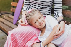 Exhausted daughter lying on her mother after active day royalty free stock photos Exhausted daughter lying on her mother after active day royalty free stock photos