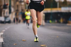 Active people running autumn fall marathon race in the city downtown. Healthy lifestyle stock photos Active people running autumn fall marathon race in the city downtown. Healthy lifestyle stock photos