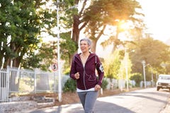 Active senior woman jogging stock photos Active senior woman jogging stock photos