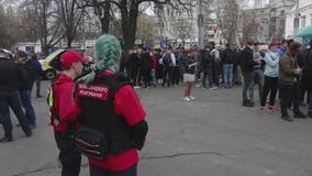 Kyiv, Ukraine. April 9, 2019. Activists and supporters of the National Corps political party attend a rally to demand an investiga stock video footage Kyiv, Ukraine. April 9, 2019. Activists and supporters of the National Corps political party attend a rally to demand an investiga stock video footage