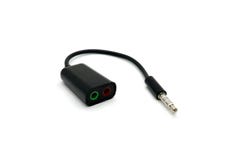 Adaptador audio con dos micrófono y conectores de auriculares aislados en blanco imagenes de archivo Adaptador audio con dos micrófono y conectores de auriculares aislados en blanco imagenes de archivo