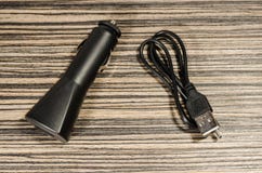 Adaptateur de téléphone pour une voiture photo stock Adaptateur de téléphone pour une voiture photo stock