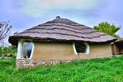 Adobe Clay House With Thatch Stock Photography